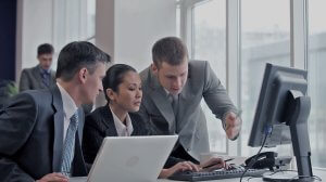 Formal desk meeting 3 people